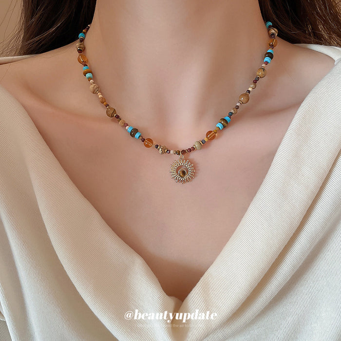 Natural Stone Seed Bead Sun Pendant Gold Tone Necklace