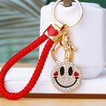 Double Sided Smiley Face Keychains in Yellow and White with Braided Loops view 8