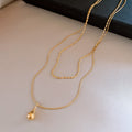 Layered Chain Necklace With Small Teardrop Pendant view 6