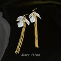 Gold Tone White Pearlescent Petal Long Chain Tassel Earrings view 3
