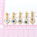 Gold Tone Mother of Pearl Evil Eye Huggie Drop Earrings view 4