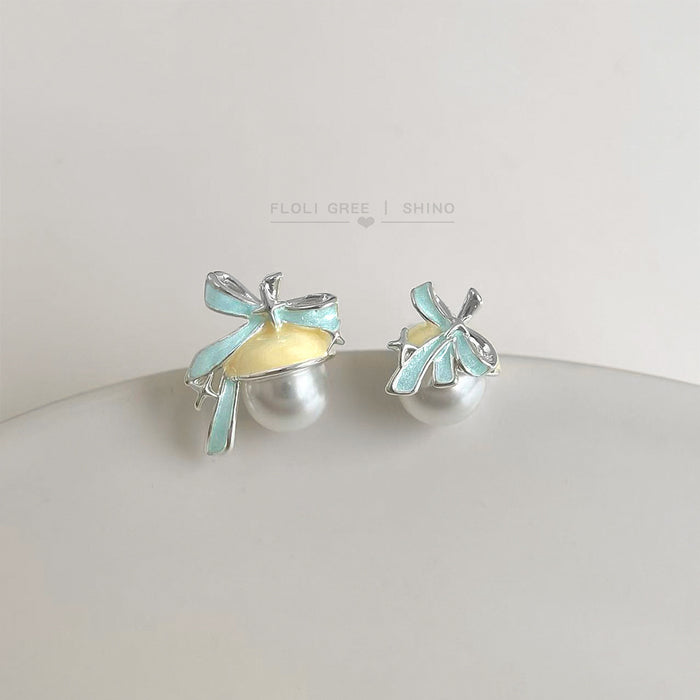 Silver Tone Pale Blue Bow And Large Pearl Like Stud Earrings