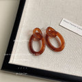Amber Marbled Resin Double Linked Oval Stud Earrings view 3