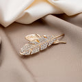 Gold Rhinestone Feather Brooch Pin With Cutout Leaf Detail view 2