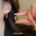 Textured Gold Tone C Hoop Stud Earrings with Crystal Accents view 2