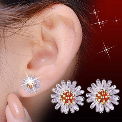 Front view of daisy stud earrings in small and large sizes with clear crystal details