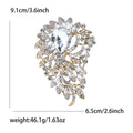 Oval Gem Feather Brooch In Eight Colorways With Polished Metal Detail view 10