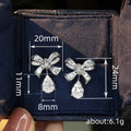 Silver Tone Baguette Bow Teardrop Drop Clear Earrings view 4