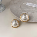 Large White Pearl Gold Rim Circular Stud Earrings Pair view 1