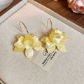 Gold Tone Hoop Earrings With Translucent Yellow Flower Drops view 6