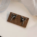 Black Butterfly Star and Cross Asymmetrical Stud Earrings view 3