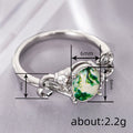 Green Patterned Oval Stone Infinity Ring In Silver Tone view 4