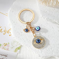 Gold Tone Blue Evil Eye Charm Keychains in Eight Designs view 5