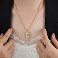 Gold Rectangular Shell Pendant Necklace Clear Center Stone Chain view 4