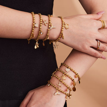 Marine and Heart Crystal Charm Bracelets in Gold Tone
