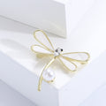 Gold Open Line Dragonfly Brooch With White Pearl Drop view 4