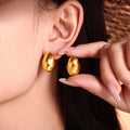 Gold Polished Egg-Shaped Oval Smooth Hoop Earrings view 1