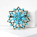 Openwork Radiating Flower Brooch in Red or Turquoise view 4