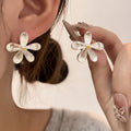 Silver Tone Clear Petal Flower Statement Stud Earrings view 1