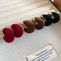 Gold Tone Flocked Crescent Stud Earrings in Black and Brown view 3