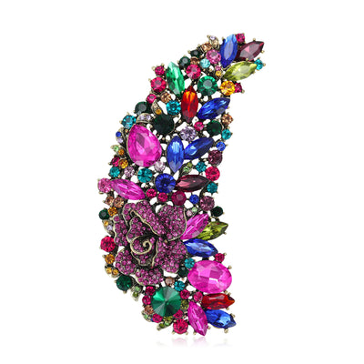 Front view of large crescent densely covered with multicolor stones and rose details