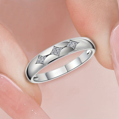 Angled silver three diamond shape clear CZ dome band ring