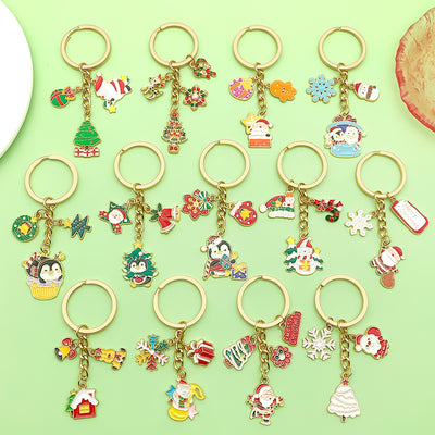 Image 1 showing a bunch of different key chains on a green surface.