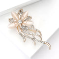 Crystal Floral Spray Brooch With Polished Metal And Sculpted Decorative Details view 3
