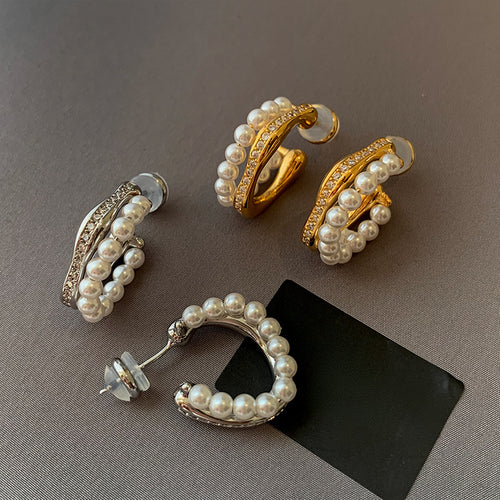 Front view of gold tone double row pearl hoop stud earrings fashion jewelry