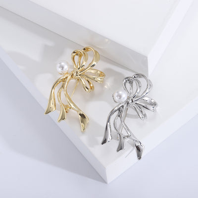 Ribbon Bow Brooch with Crystal Bud Accents displayed from the front