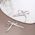 Silver Herringbone Ribbon Bow Stud Earrings Polished Metal view 3