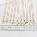 Gold Tone Blue Evil Eye Pendant Necklaces in Ten Symbolic Designs view 2