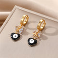 Gold Tone Bow and Heart Evil Eye Huggie Drop Earrings view 7