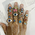 Gold Tone Colorful Evil Eye and Motif Adjustable Rings in Fourteen Designs view 1