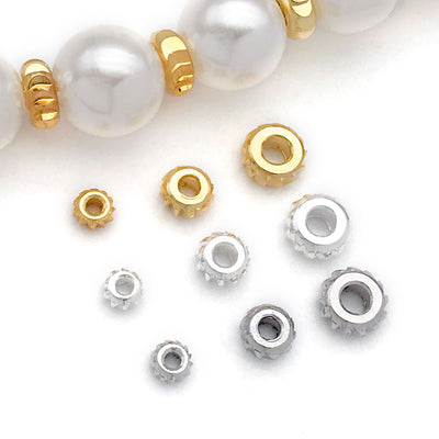 Faceted metal rondelle spacer beads arranged as a full product overview