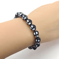 Black Skull Bead Stretch Bracelet White Eye Accents view 4