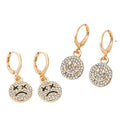 Gold Tone Crystal Smile and Frown Medallion Huggie Earrings view 5