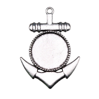 Anchor Round Cabochon Pendant Tray displayed in a hand for shape and finish detail