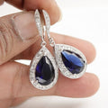 Blue Pear Stone Teardrop Halo Earrings with Clear Stone Details view 1