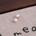 White Pearl Look Round Stud Earrings in Five Sizes view 4