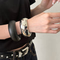 Wide Domed Mirror Finish Silver Metal Bangle Medium view 3