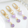 Iridescent Heart Bead Keychain With Purple Enamel Letter Charm view 1