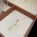 Crescent Moon and Starburst Pendant Necklace with Metal Settings view 4