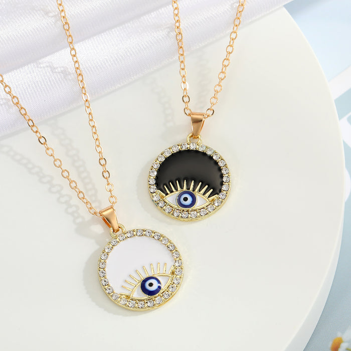 Gold Tone Crystal Evil Eye Round Pendant Necklaces in Two Colors
