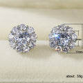Silver-Tone Brass Flower Studs with a Clear Cubic Zirconia Center view 5