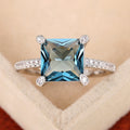 Silver Tone Square Blue CZ Four-Prong Pave Band Ring view 3