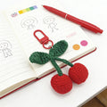 Crocheted Red Cherry Keychain with Green Leaves and Red Metal Clasp view 3