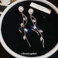Silver Tone Pearl and Crystal Leaf Drop Earrings With Decorative Details view 2