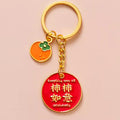 Chinese Fruit Pun Blessing Plaque Keychains in Five Distinct Designs view 3