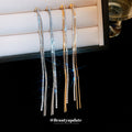 Slim Gold Tone Crystal Chain Tassel Earrings with Bar Tops view 2